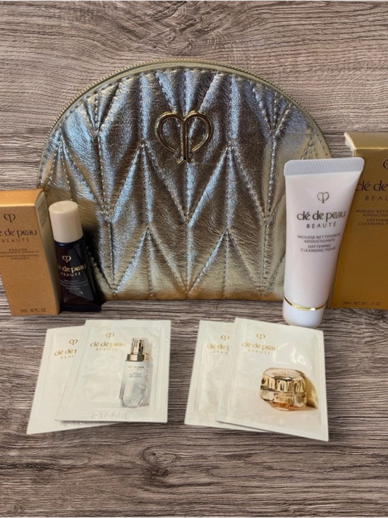 cle de peau Other - Cle De Peau 7 Piece Beauty Set with Gold Bag